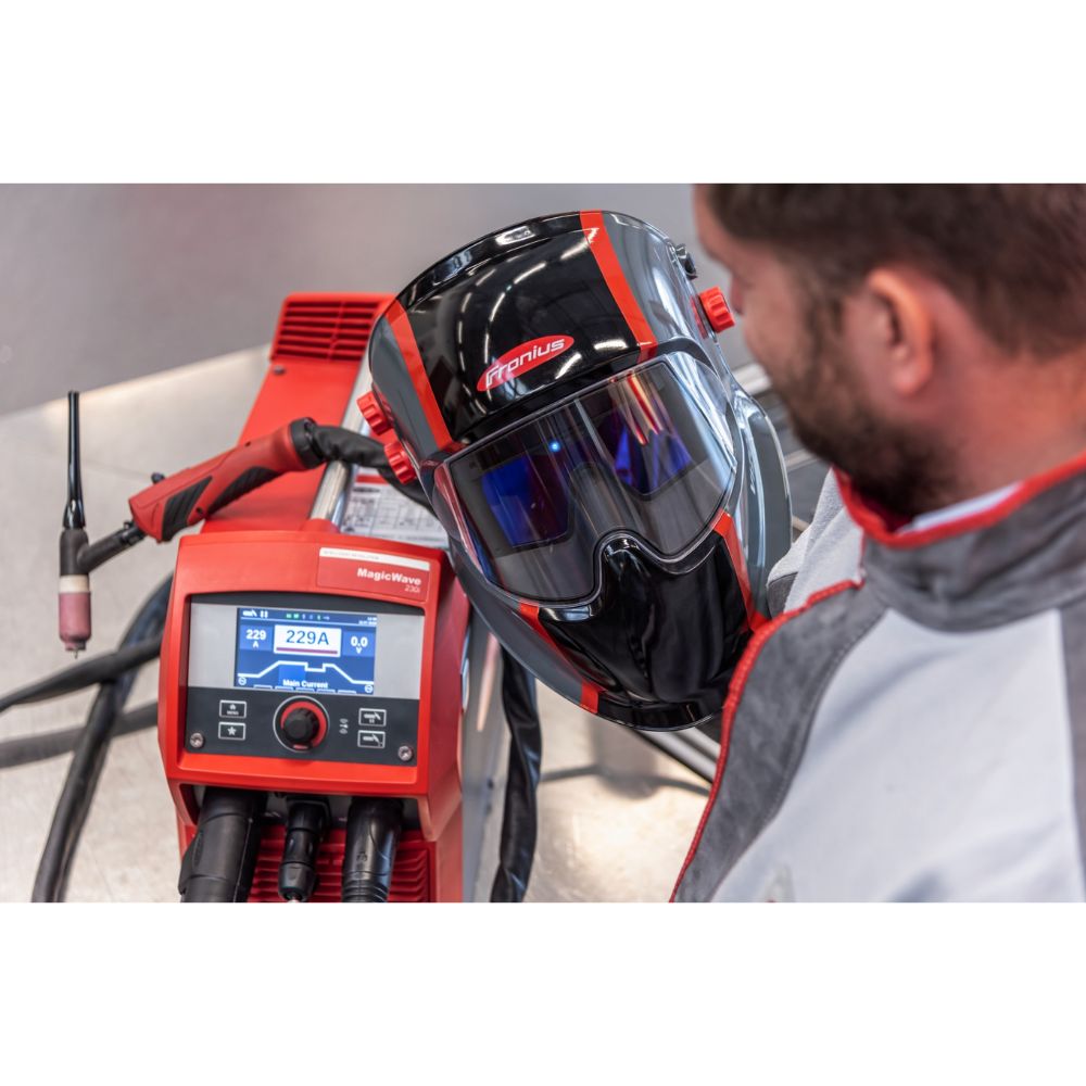 Fronius Vizor Connect Bluetooth welding helmet being connect to a welder